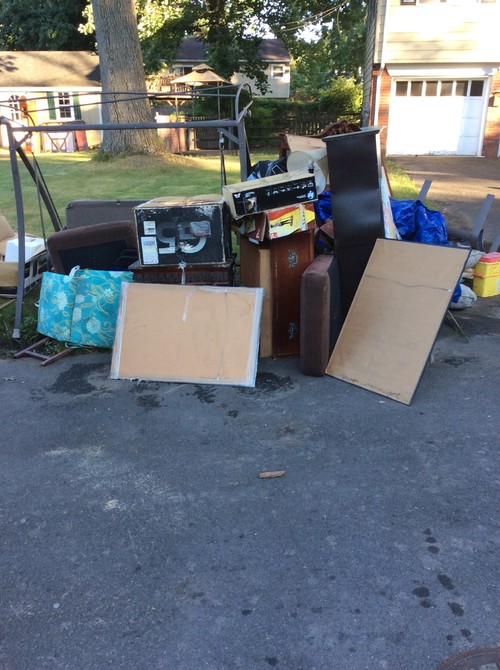 picking-up-junk-from-driveway